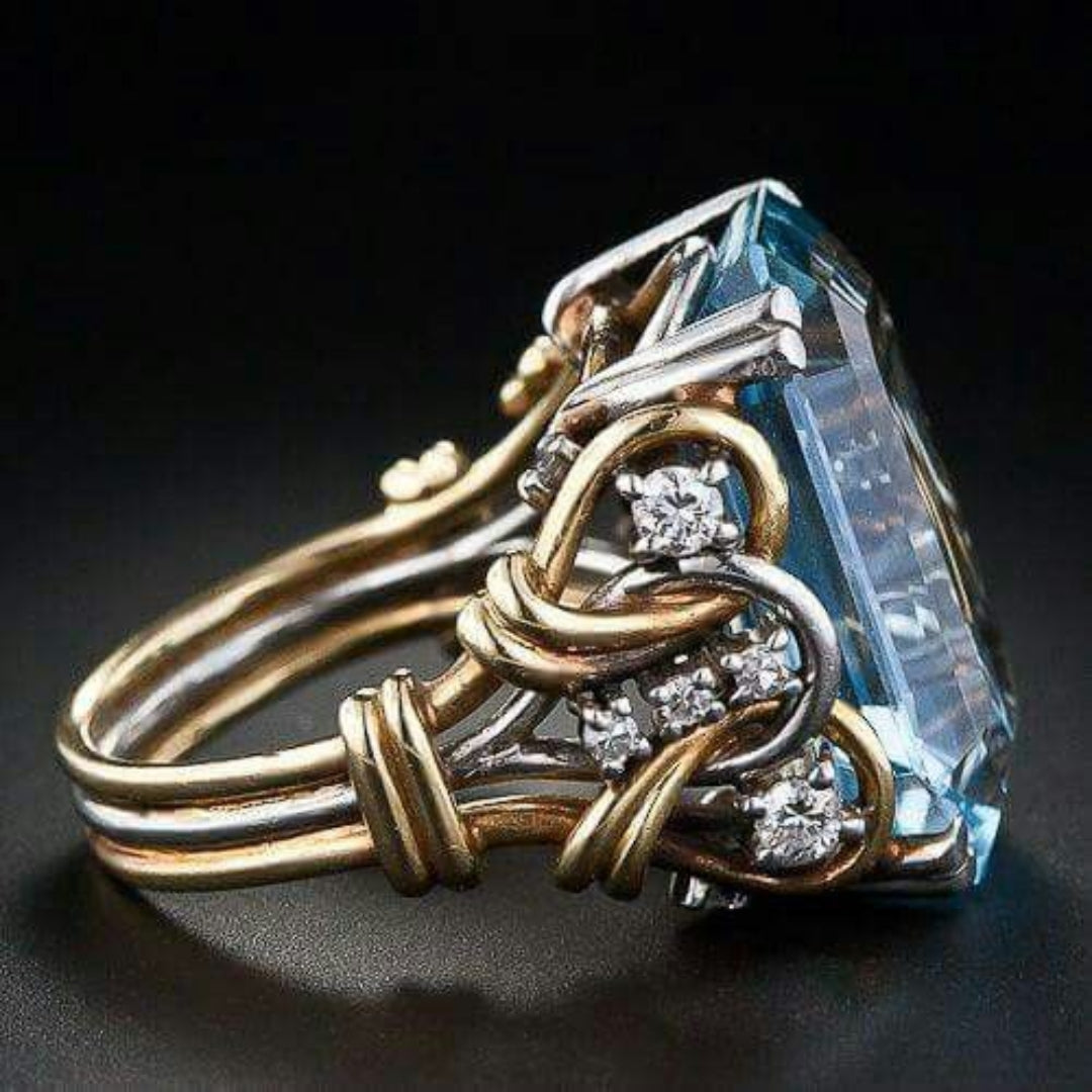 Aufwändiger Ring mit eingelegtem blauem Zirkon im Vintage-Stil