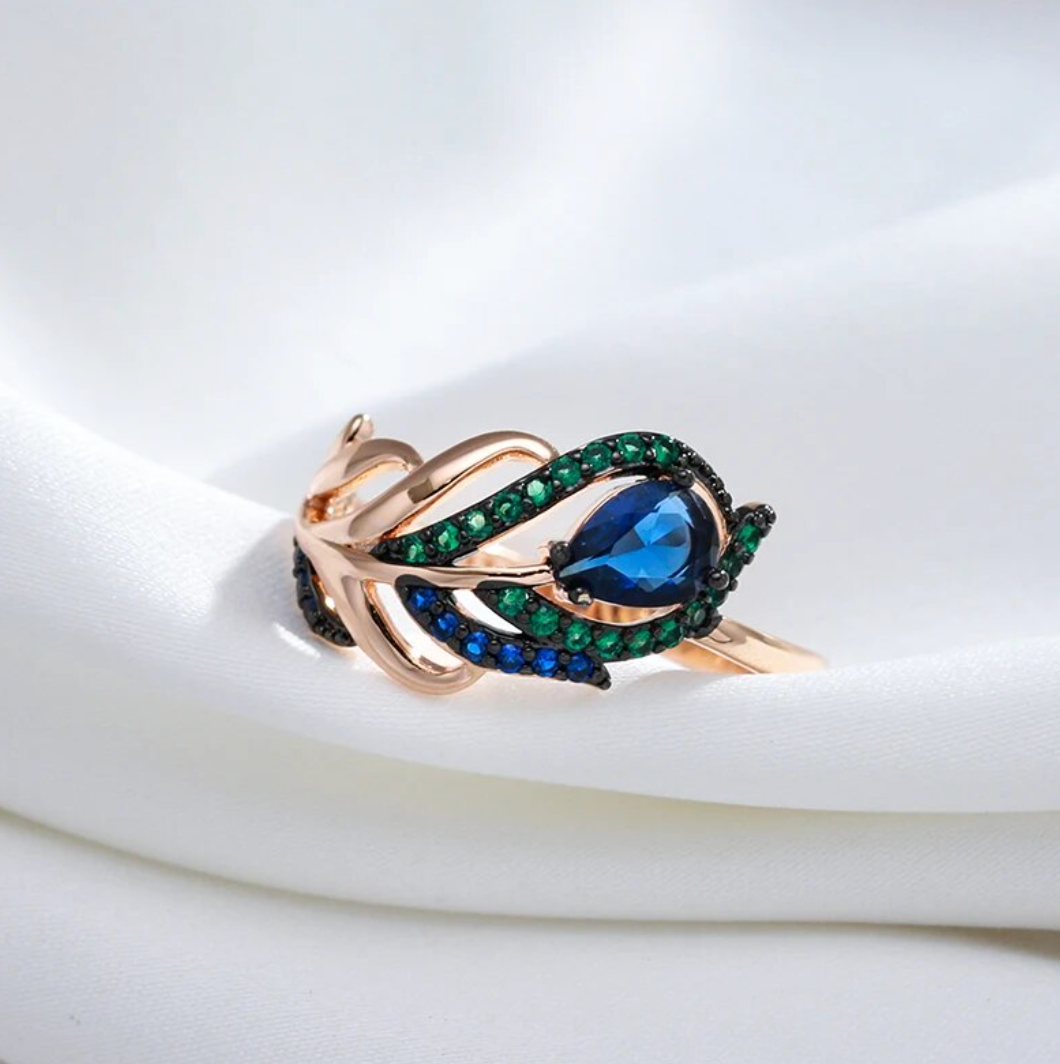 Elegantes Pfau-Set aus 18K Rosé-Vergoldung