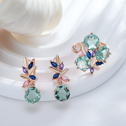 Elegantes Aquamarinblumen-Set in Roségold Farbe