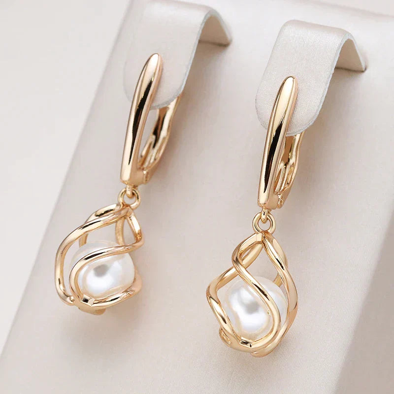 Elegante Perlenohrringe in Gold