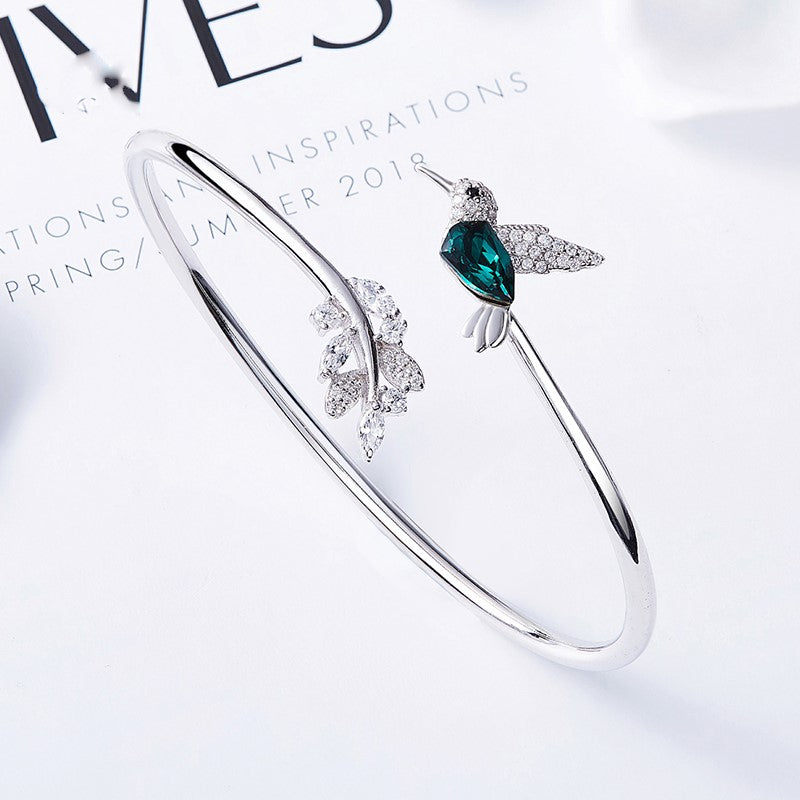 AYANA – Eleganter verstellbarer Kolibri-Ring mit funkelndem Strassdiamant