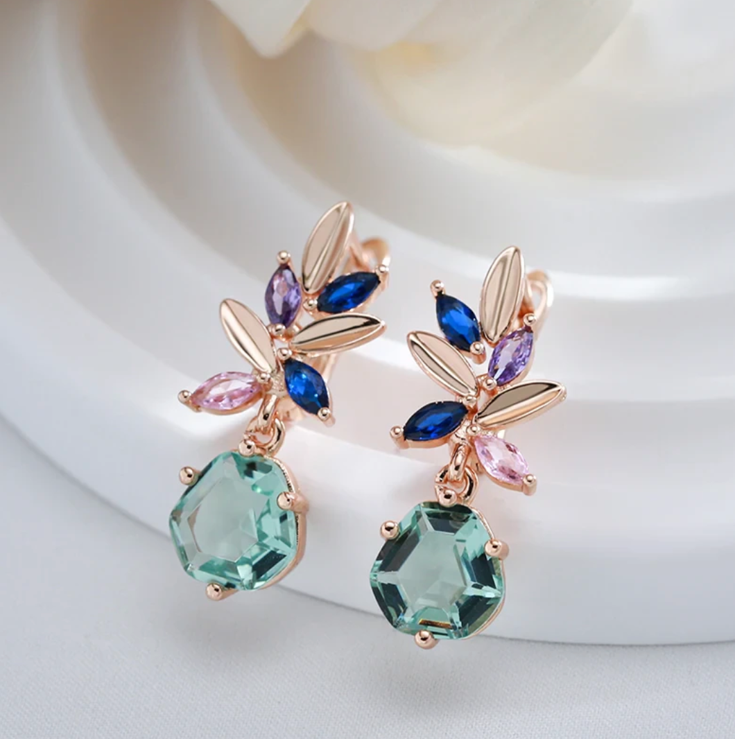 Elegantes Aquamarinblumen-Set in Roségold Farbe