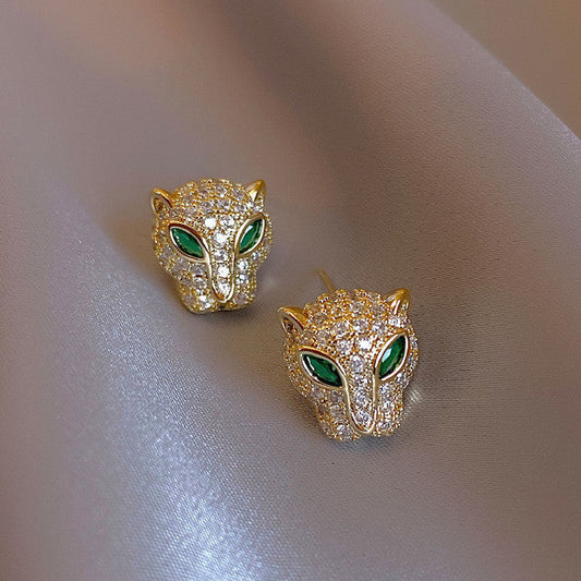 Glänzende Leoparden-Ohrringe in Gold